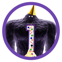 Monster wearing a party hat behind a cupcake with a number one candle.