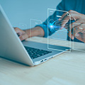 Hand typing on a keyboard