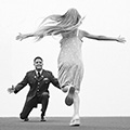 Child running to male soldier in uniform with arms wide open - veteran hiring guide